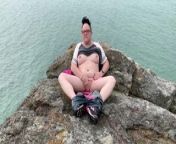 Zoey masturbating in public high on a rock in the harbor from high on helium