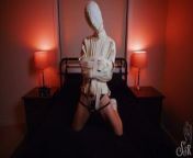 Miss V in a tight straitjacket with attached vibrator from back v
