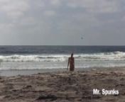 She Gives an Amazing Blow Job on a Public Nude Beach as People Walk By from laying on nude beach